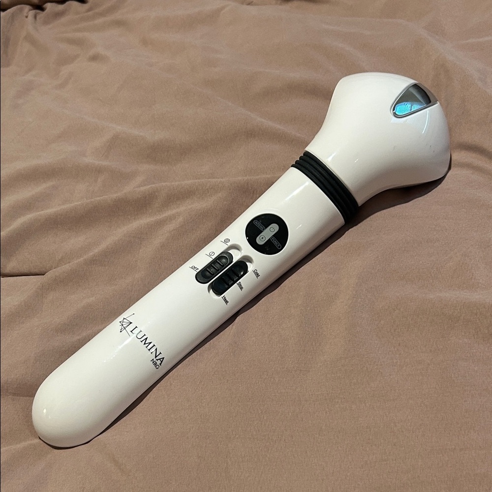 White Handheld Massager by Luminara